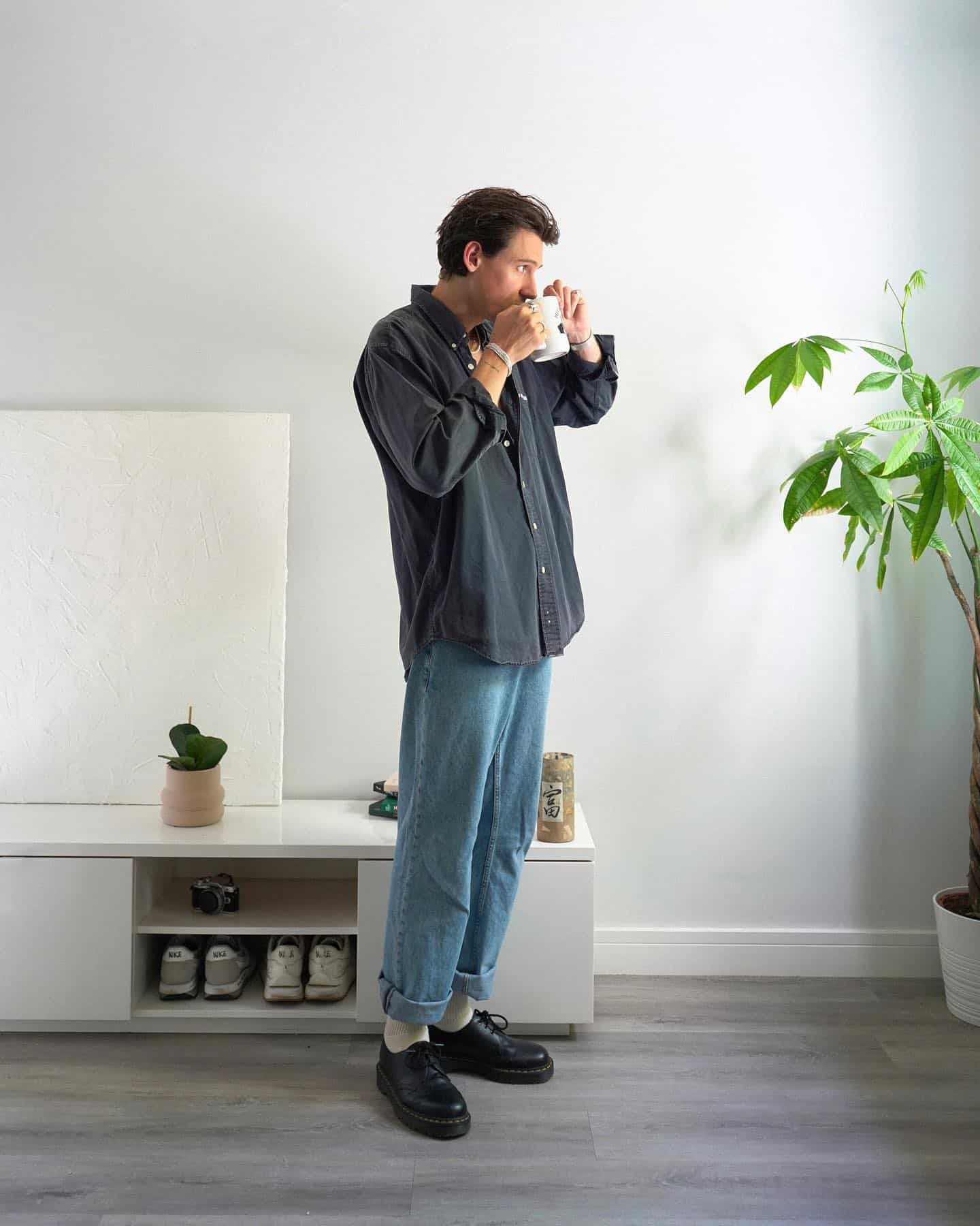 man having a cup of coffee