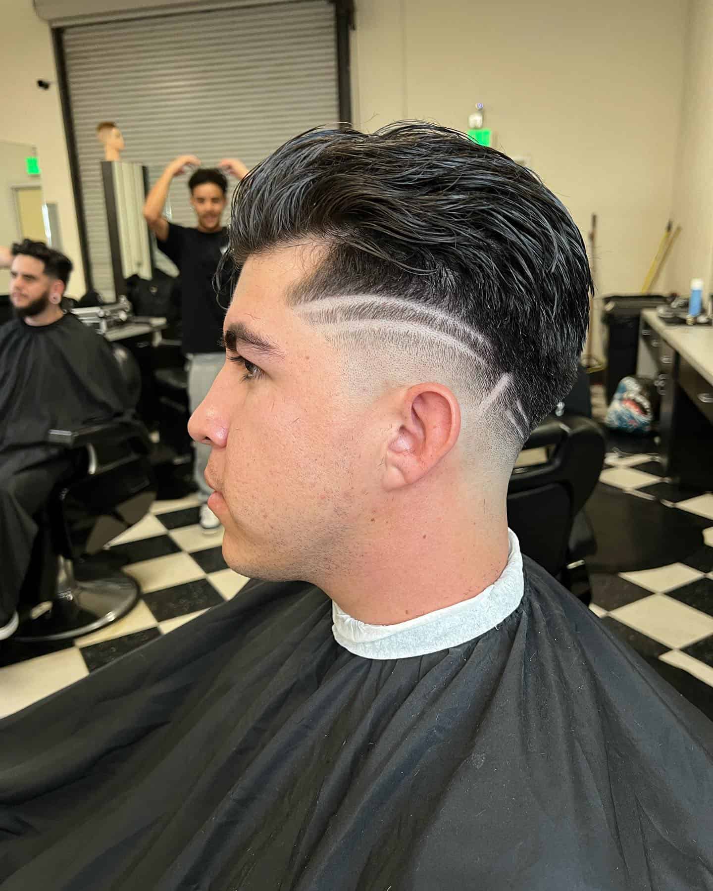 man with a fresh barber fades