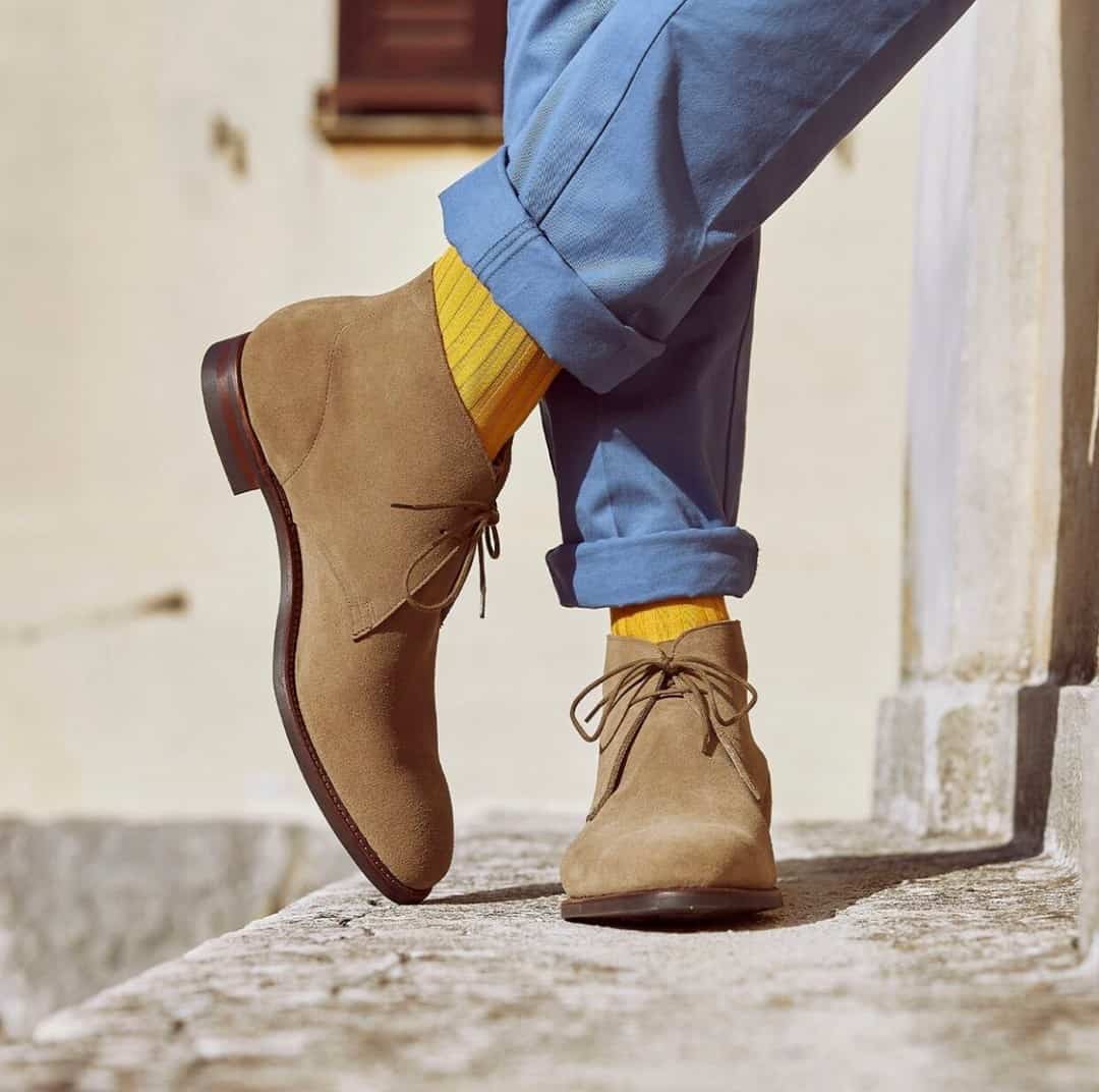 wearing a pair of dessert boots