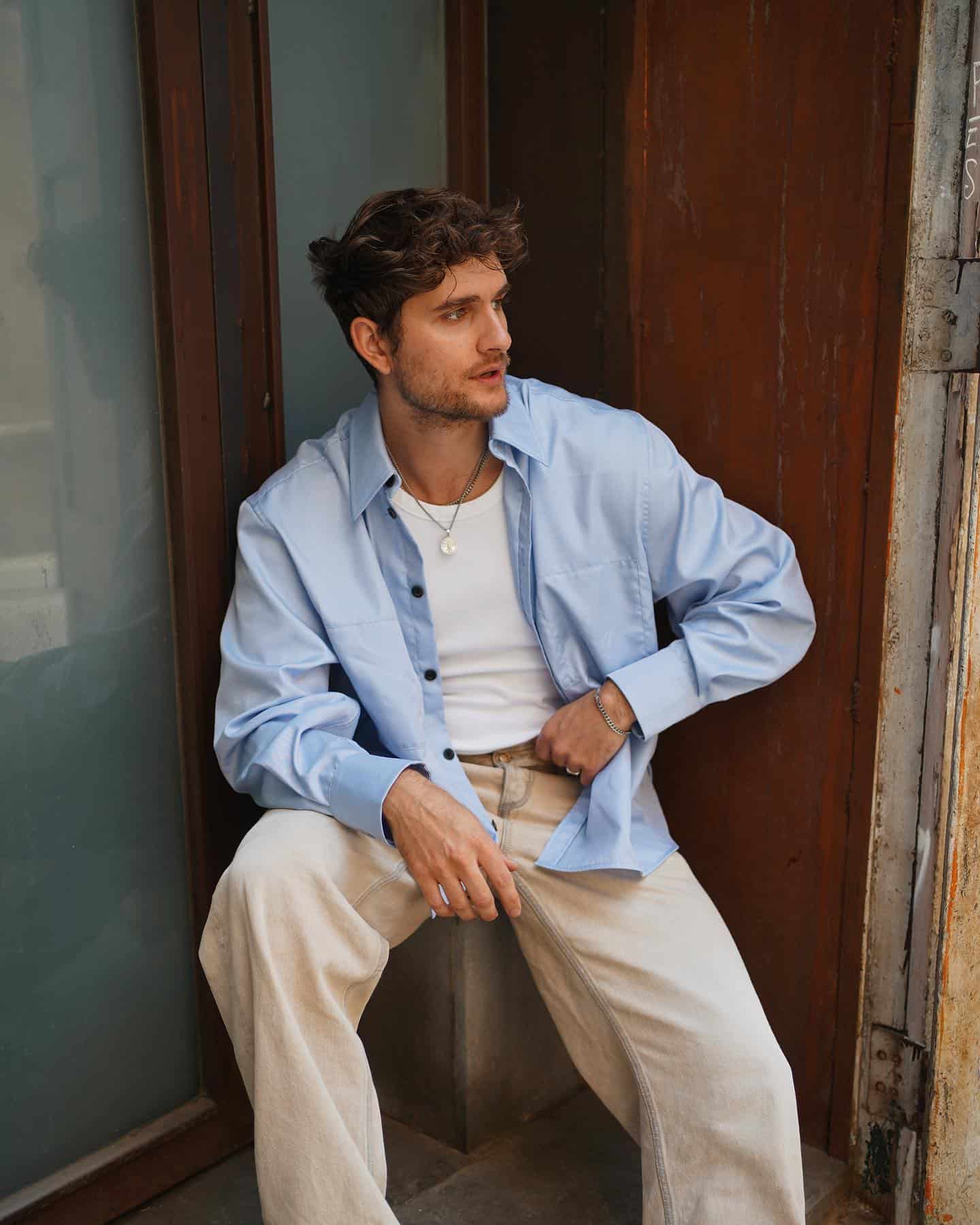 man sitting on a concrete box