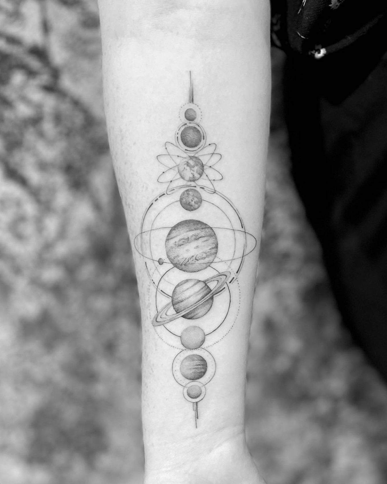 solar system tattoo on arm
