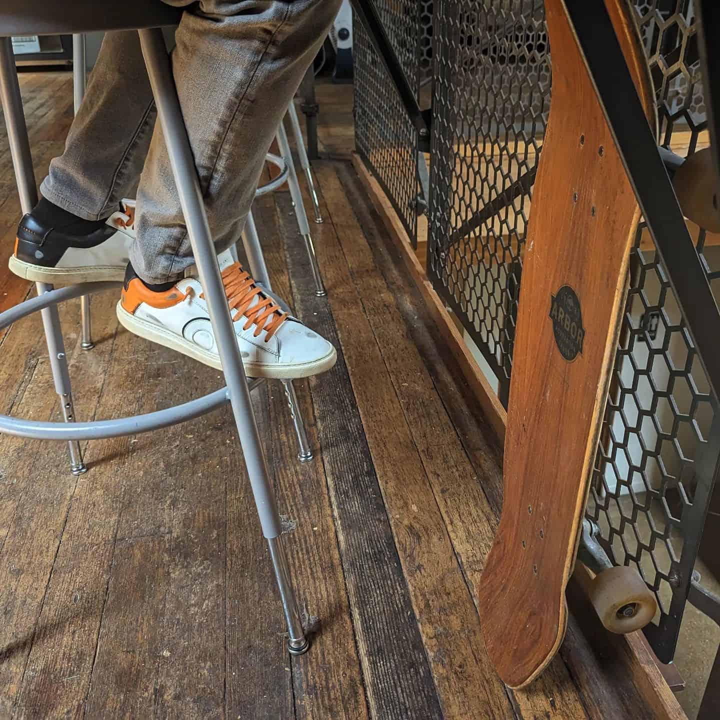 wearing a pair of oliver cabell sneakers for skateboarding
