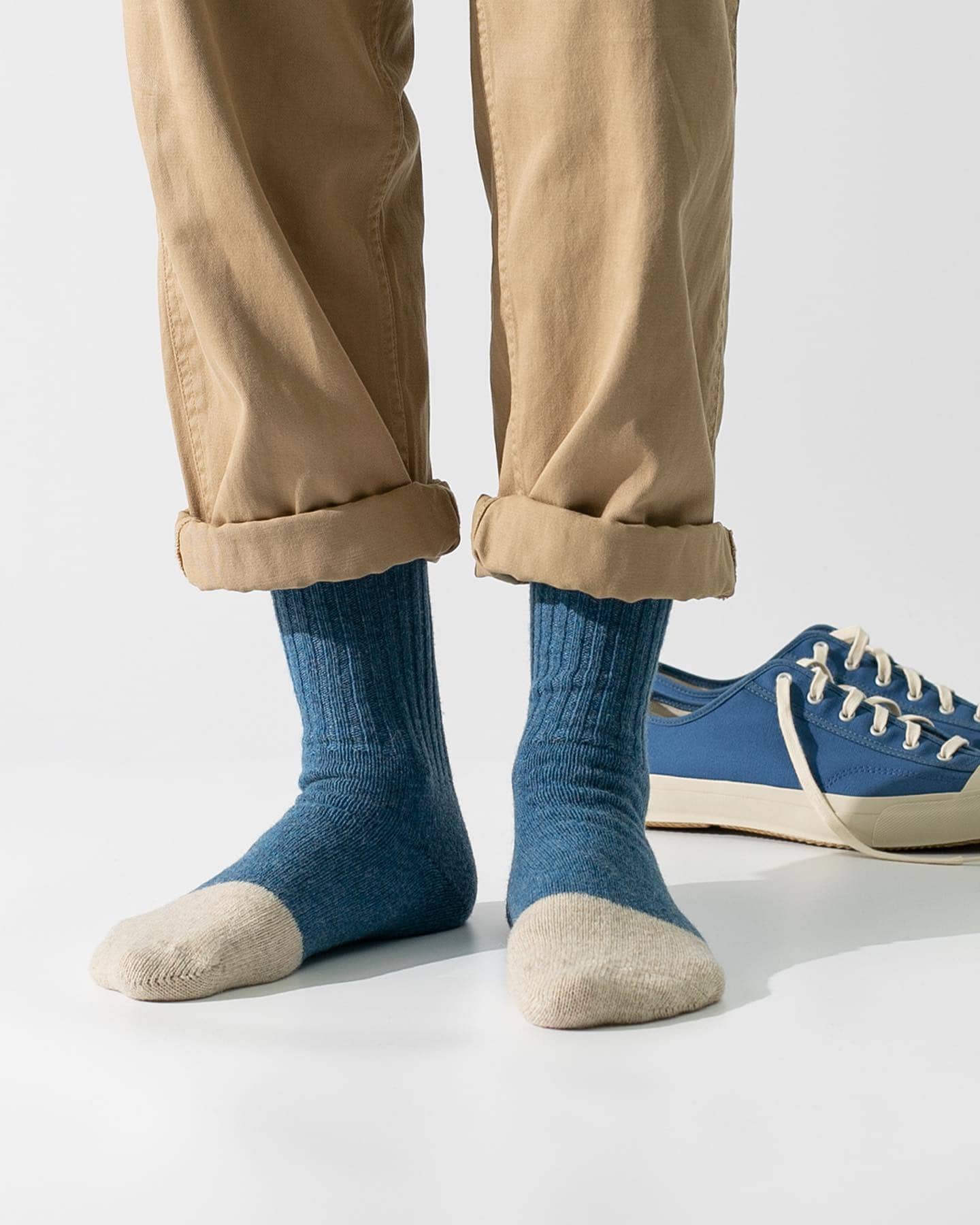 a pair of wool socks by thunderslove
