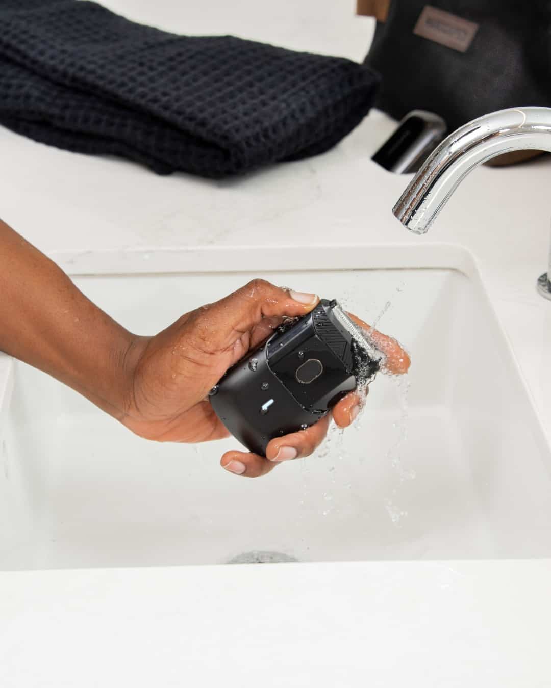 washing an electric shaver