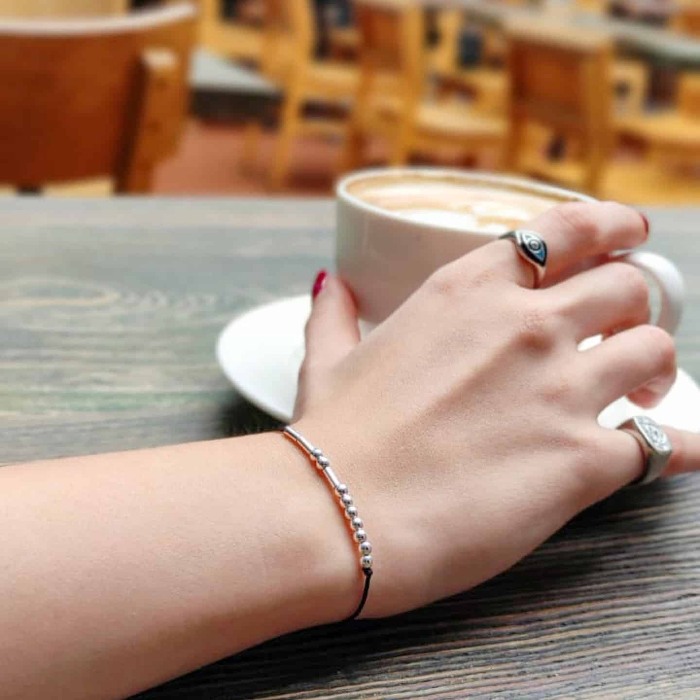 woman holding a cup of coffee