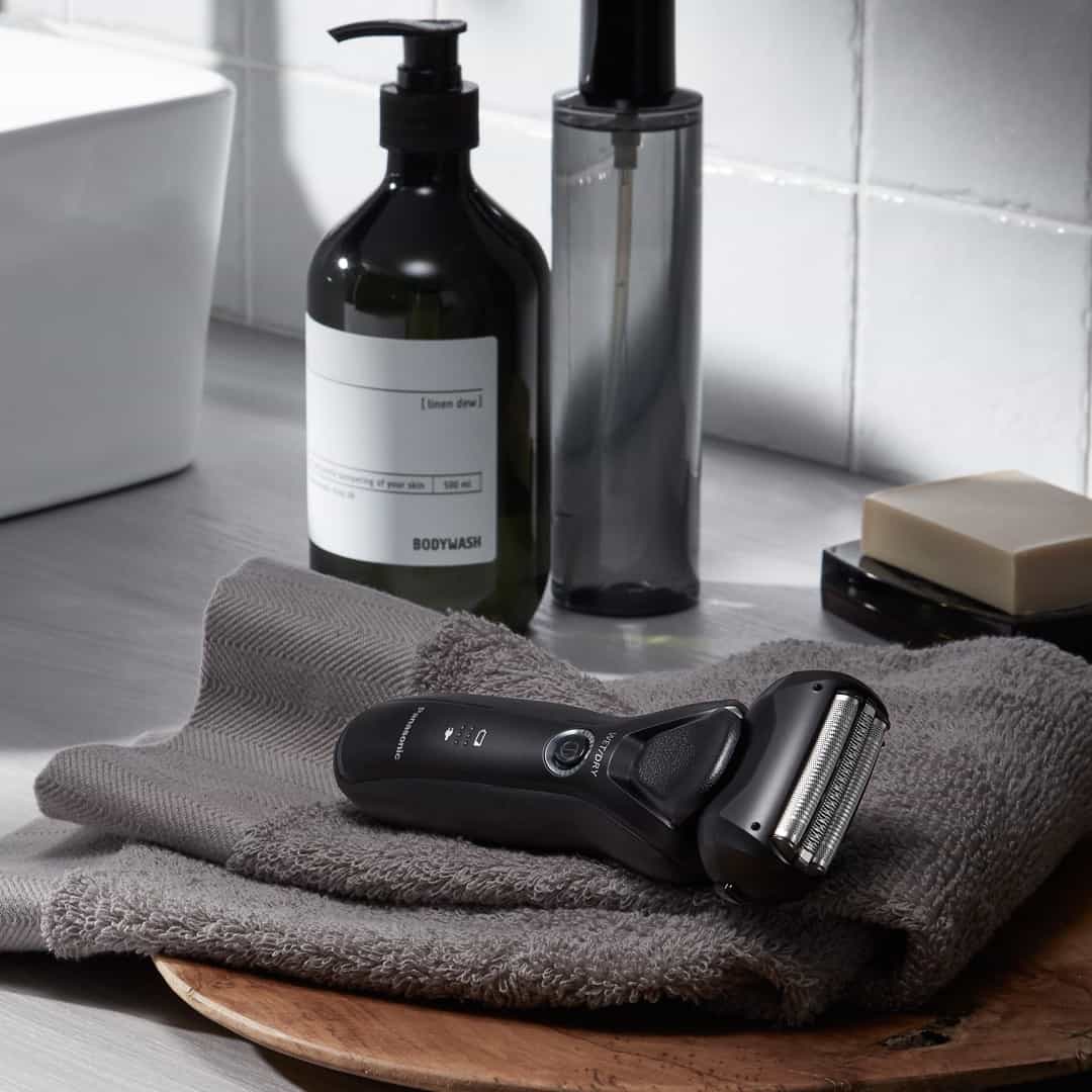 panasonic shaver on top of a face towel