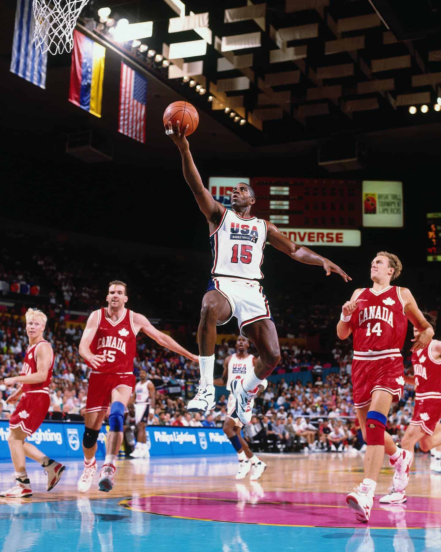 man holding a basketball in the air