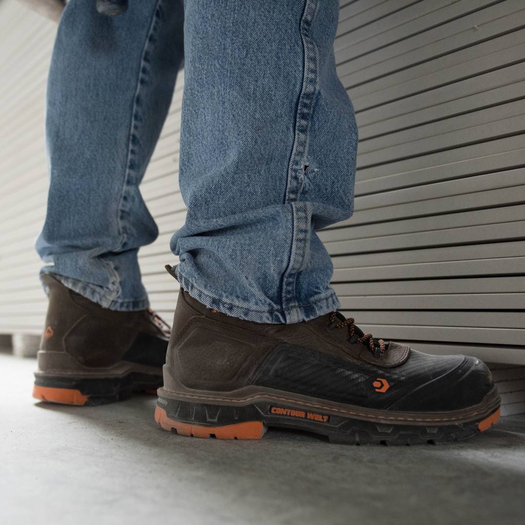 wearing a pair of work boots by wolverine