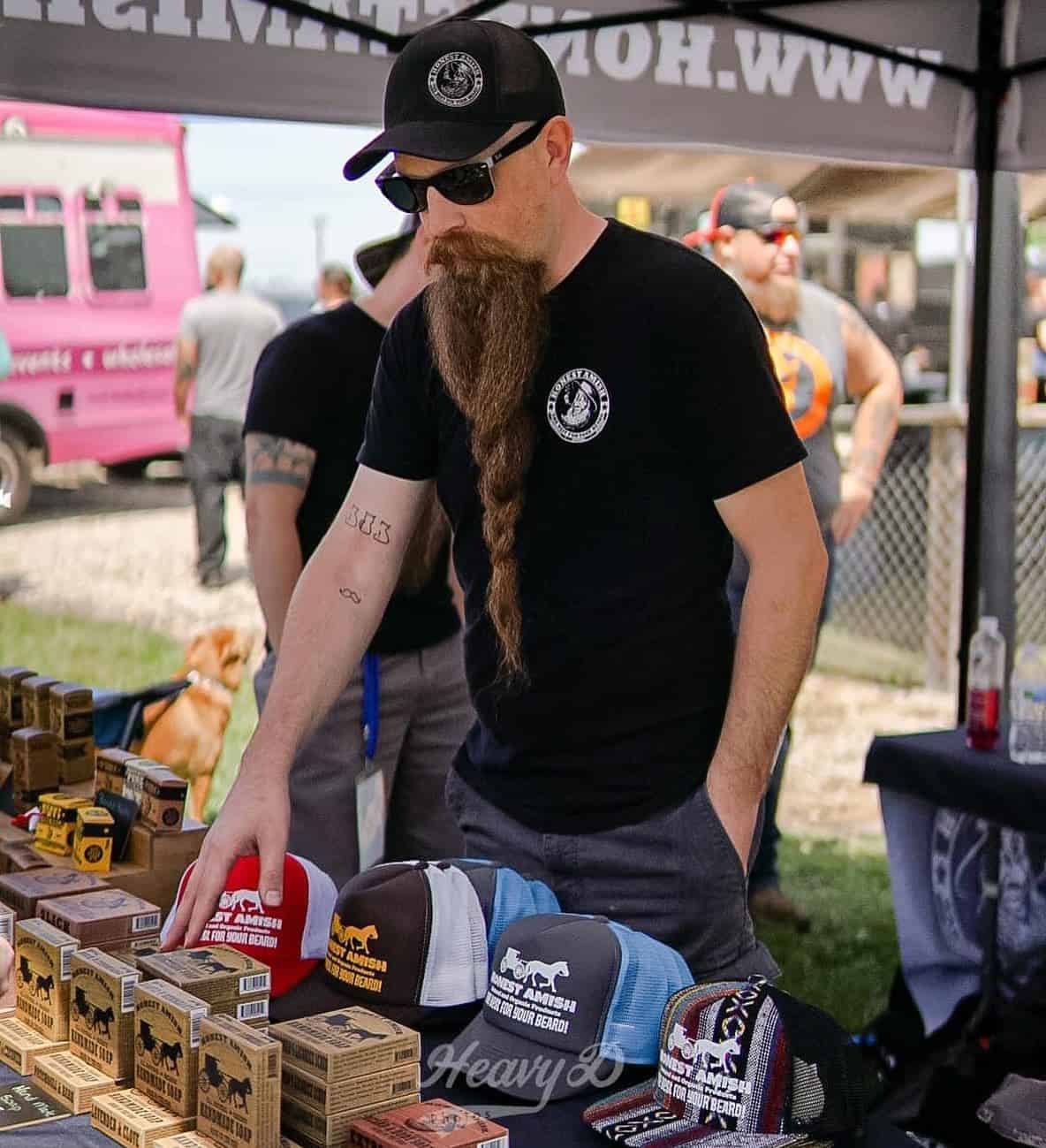man selling beard grooming products