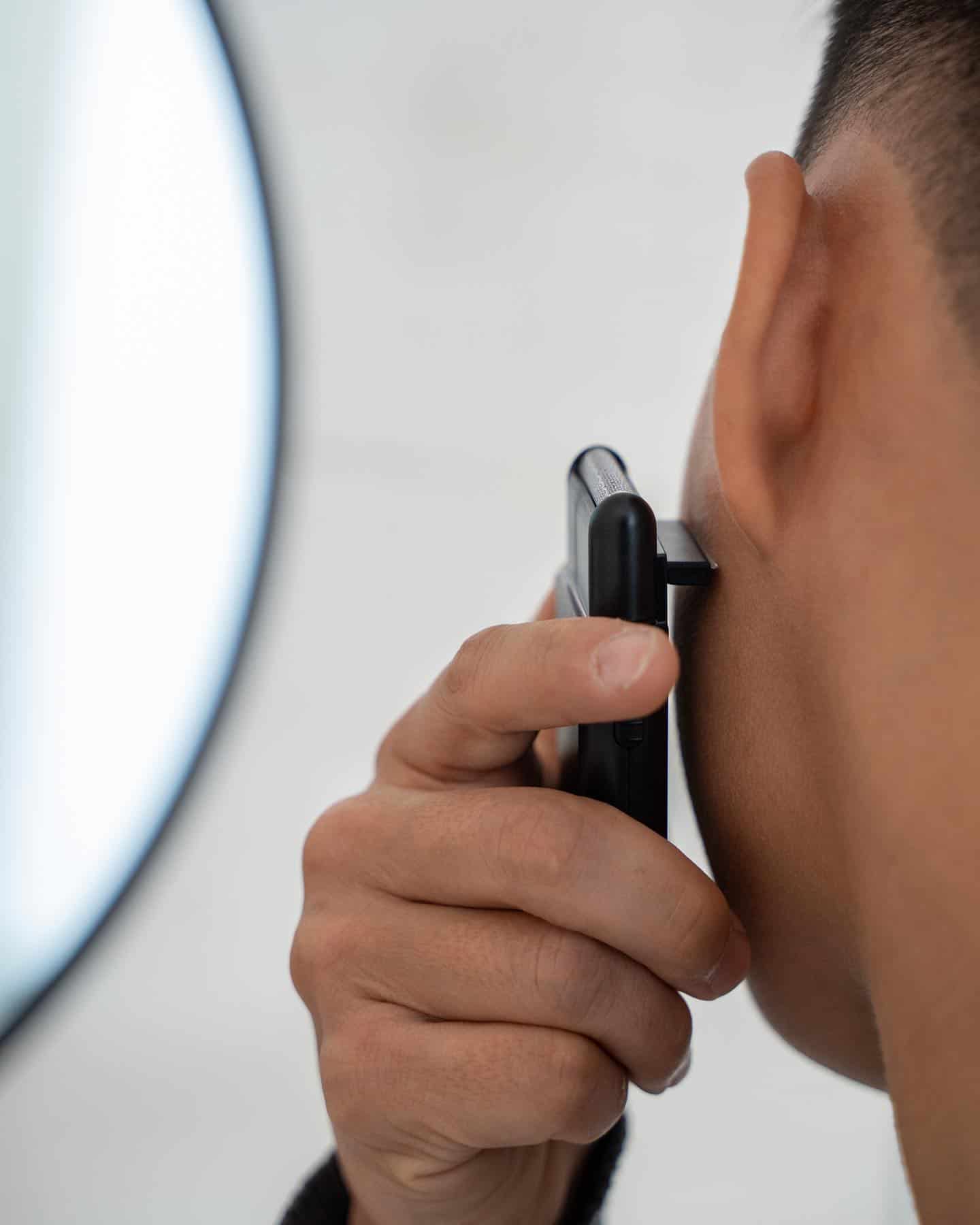 trimming beard with a pop-up trimmer