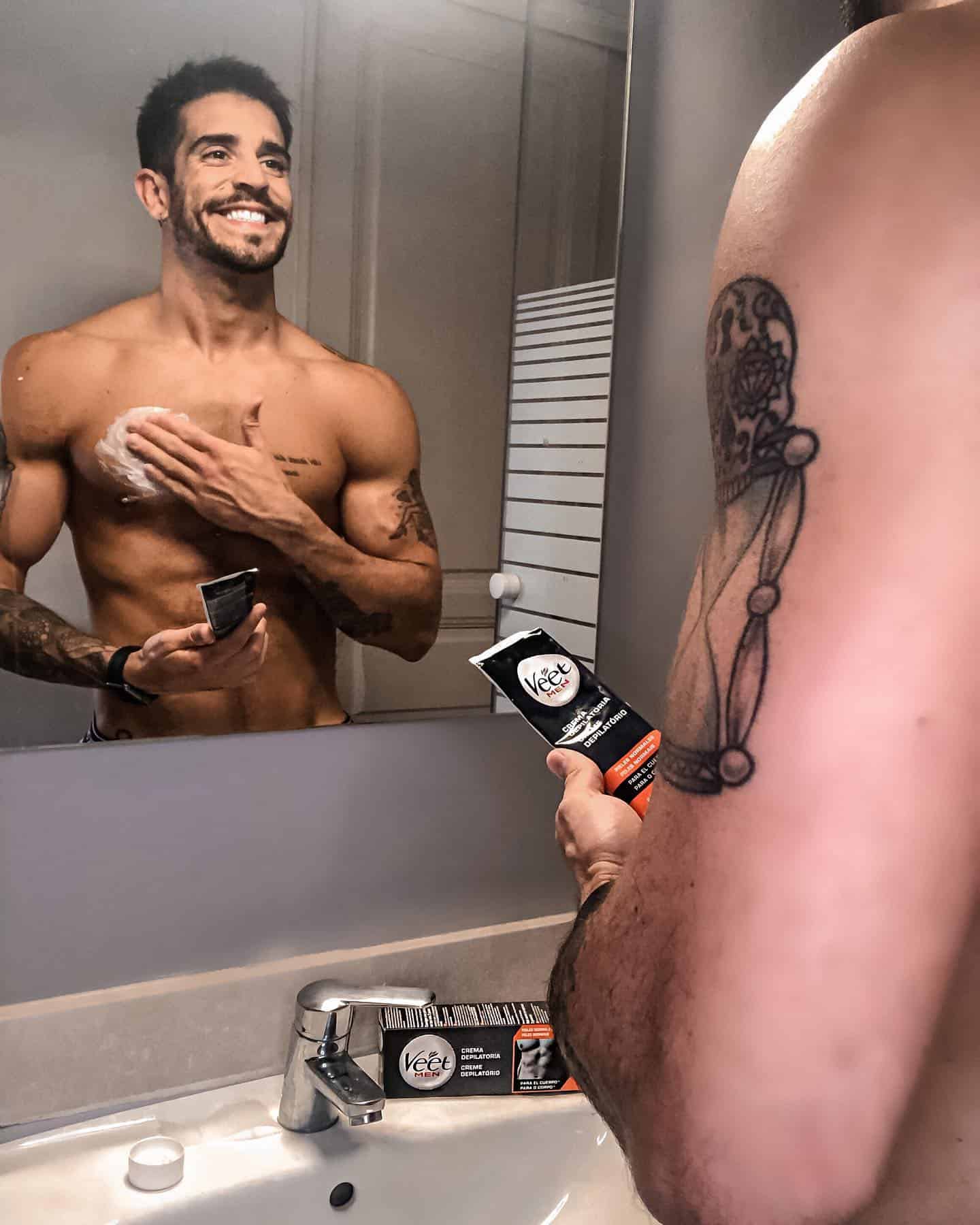 applying a veet hair removal cream on the chest