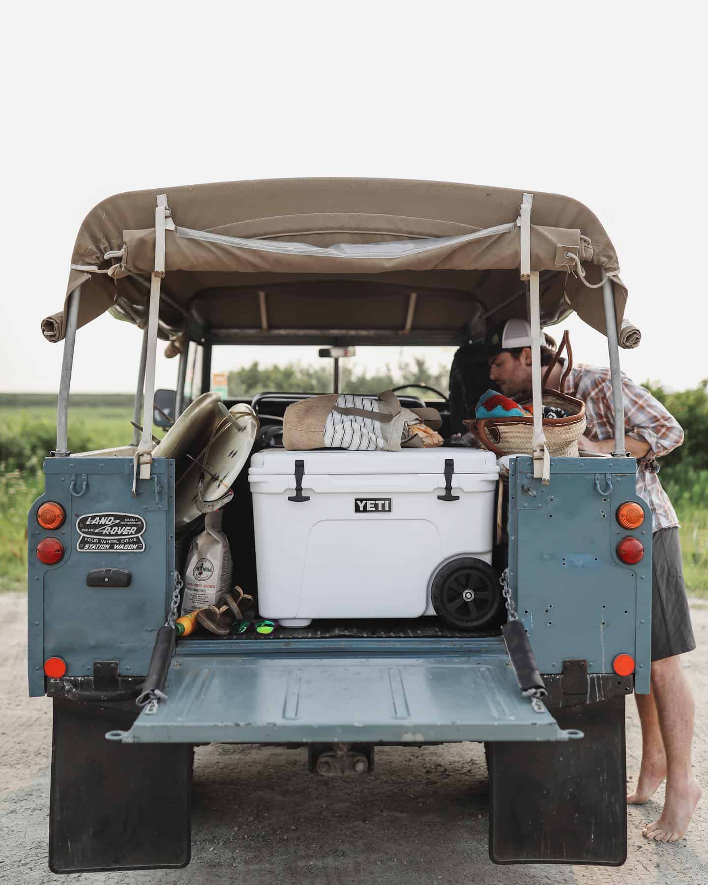 beach essentials in a land rover