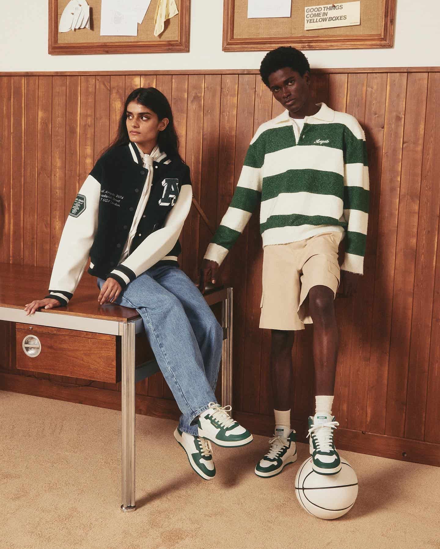 man and woman wearing dice sneakers by axel arigato