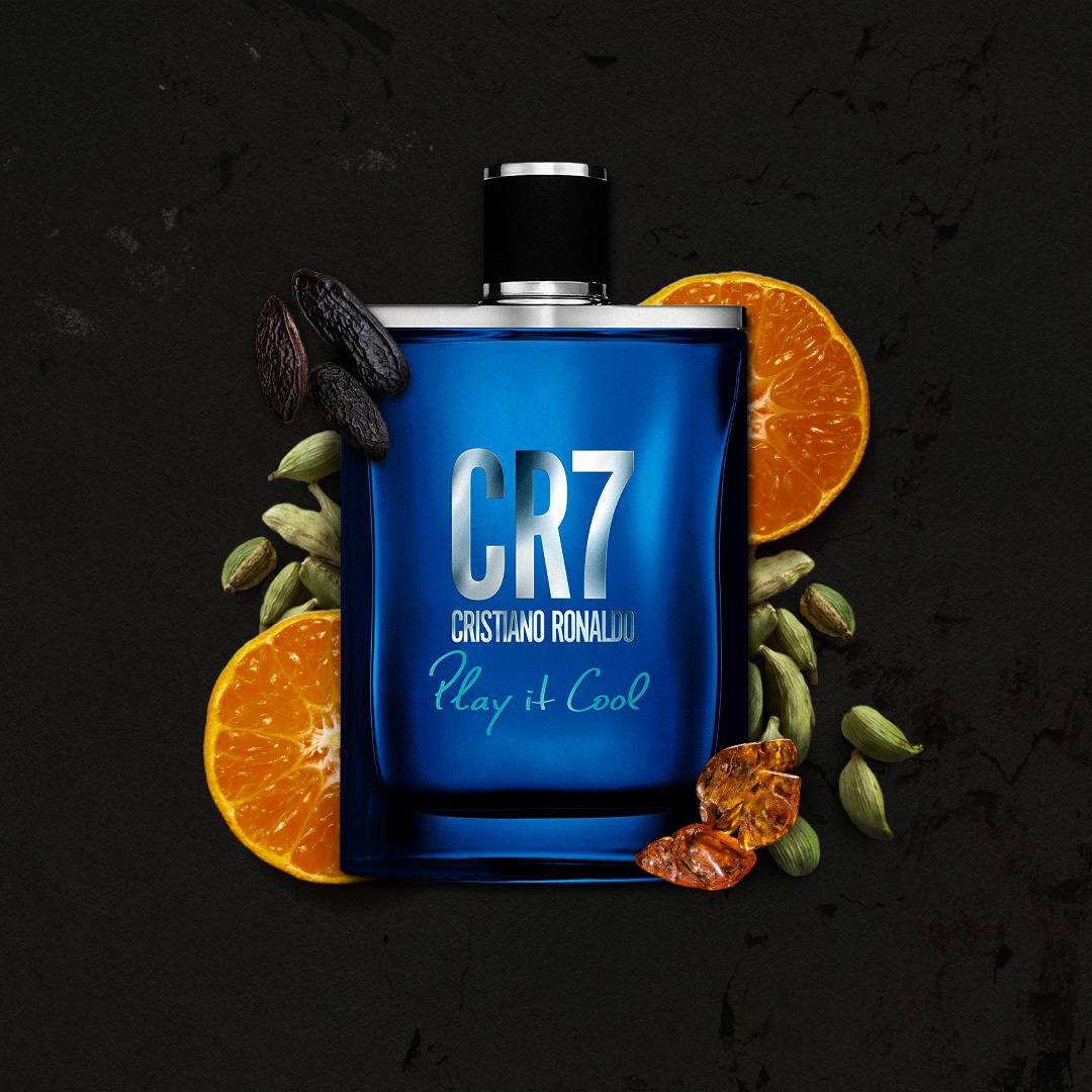 a bottle of cr7 play it cool with base notes ingredients in raw form