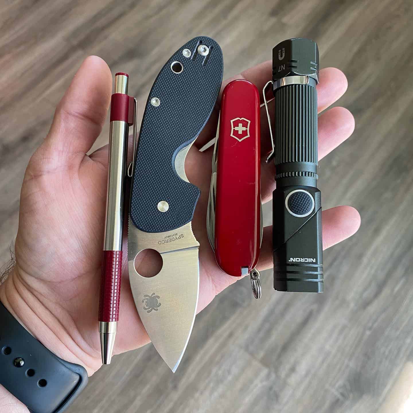 holding a collection of EDC essentials