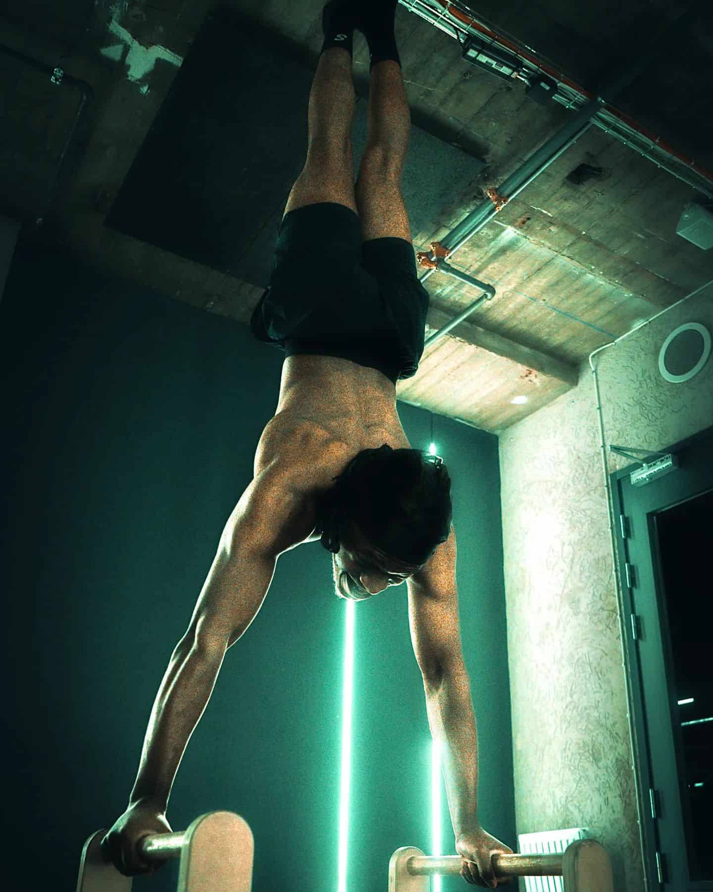 man doing a hand stand