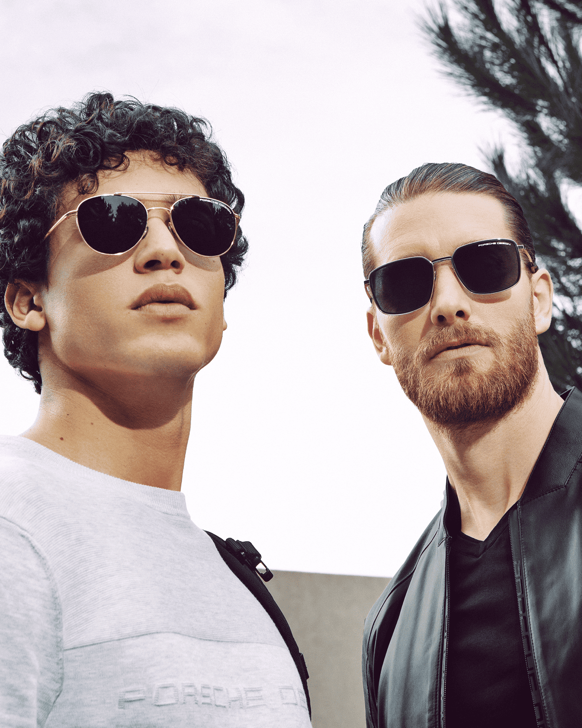 two men wearing sunglasses