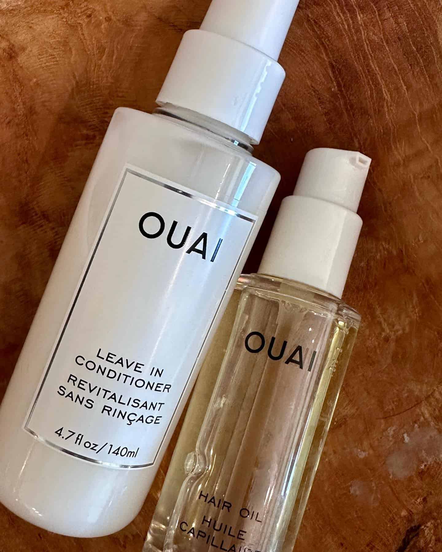 a bottle of leave-in conditioner and hair oil by ouai