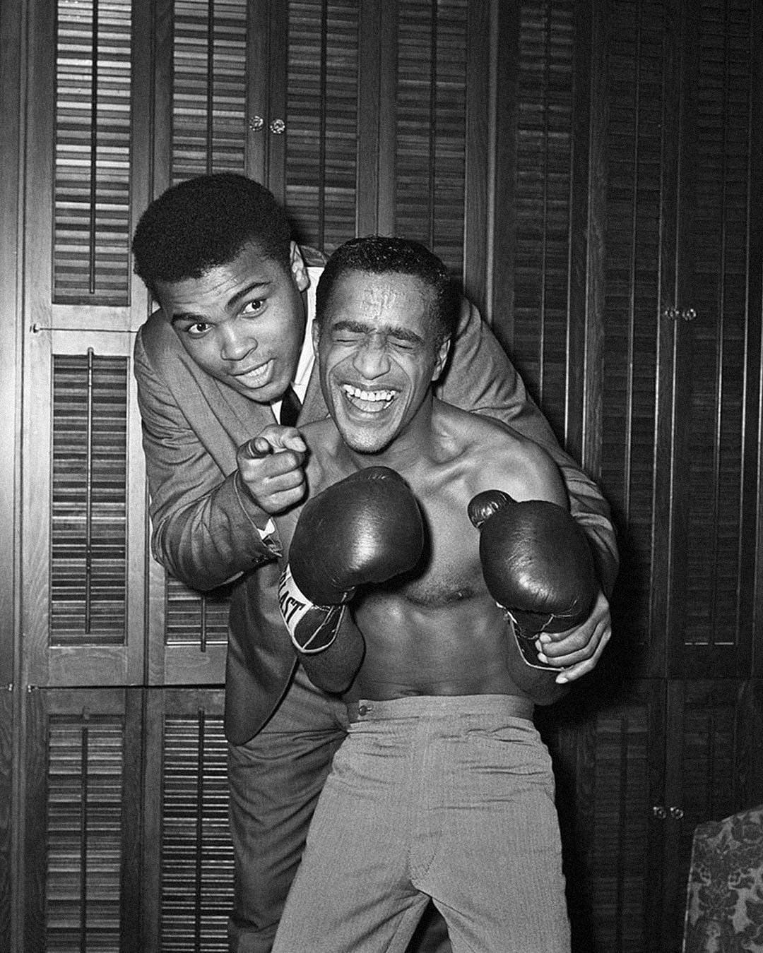 muhammad ali teaching another person to box