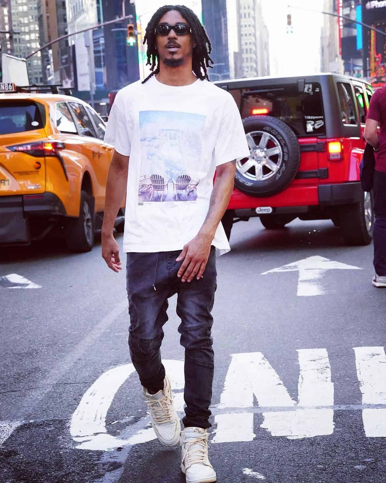 man wearing a low tapered jeans