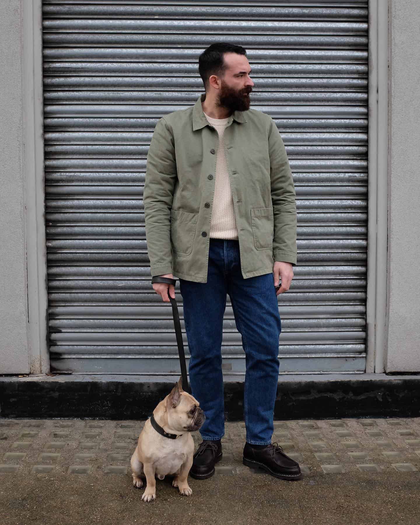 a man and his dog on a leash
