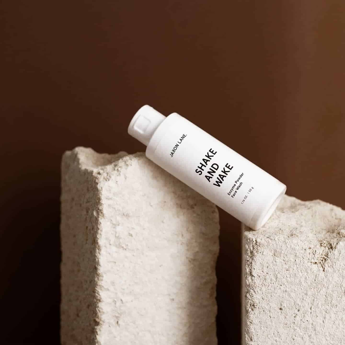a bottle of shake and wake face wash by jaxon lane