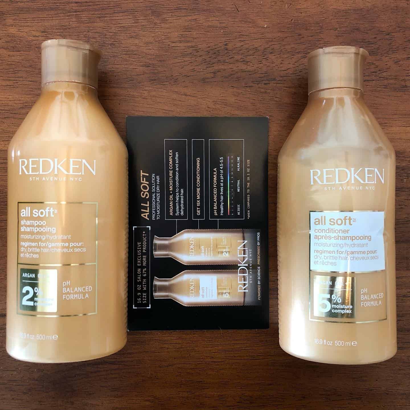 a pair of all soft shampoo and conditioner by redken