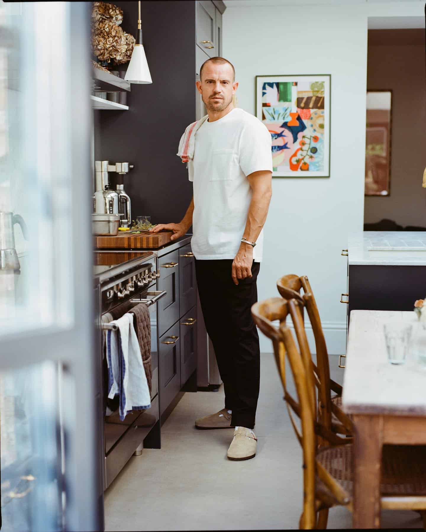 man preparing to cook food in the kitchen