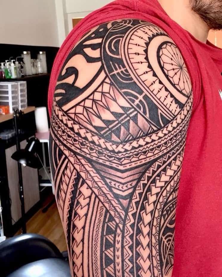 tribal tattoo on right arm