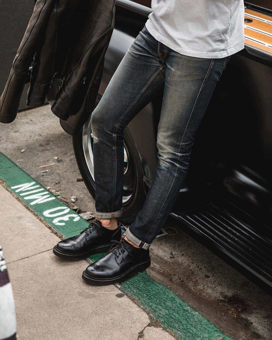 man wearing a pair of skinny tapered jeans