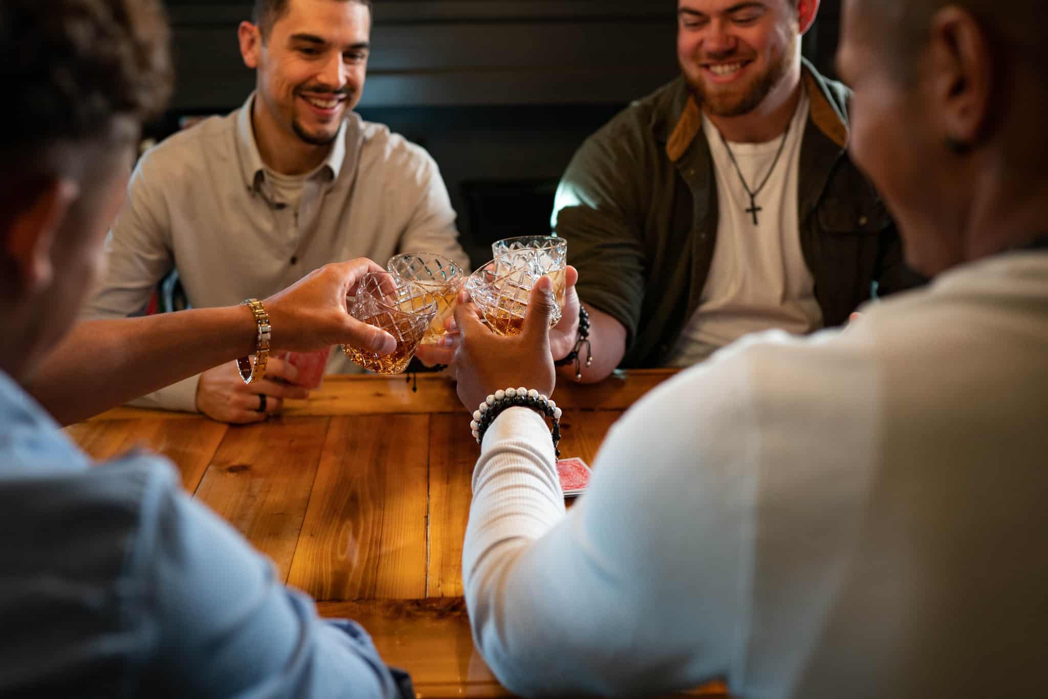 a group of men having a toast