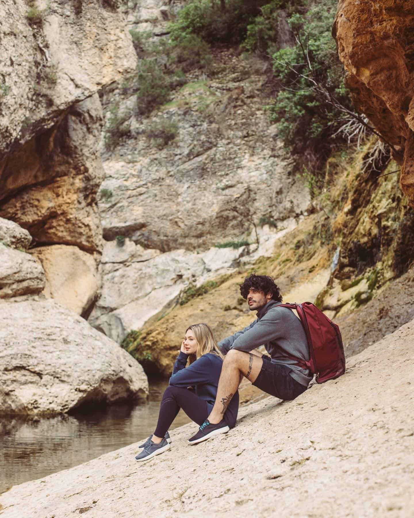 couple sitting on the slope