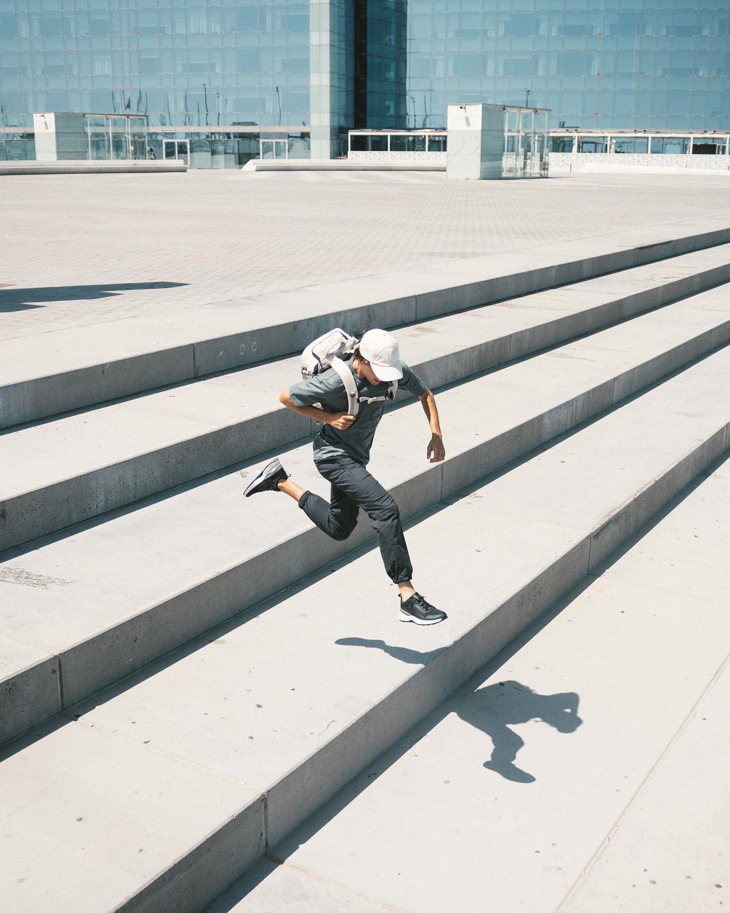man running down the stairs