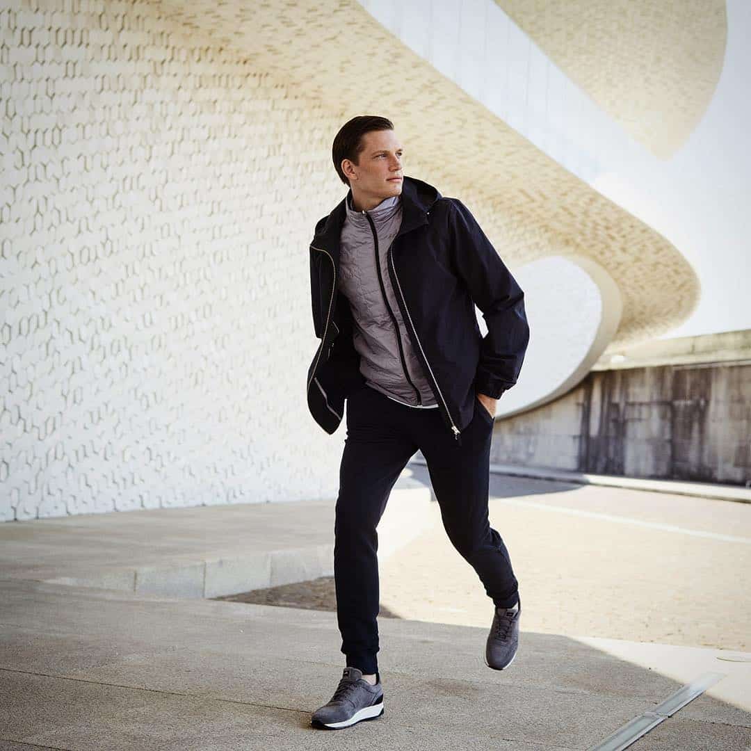man wearing a water repellent light jacket