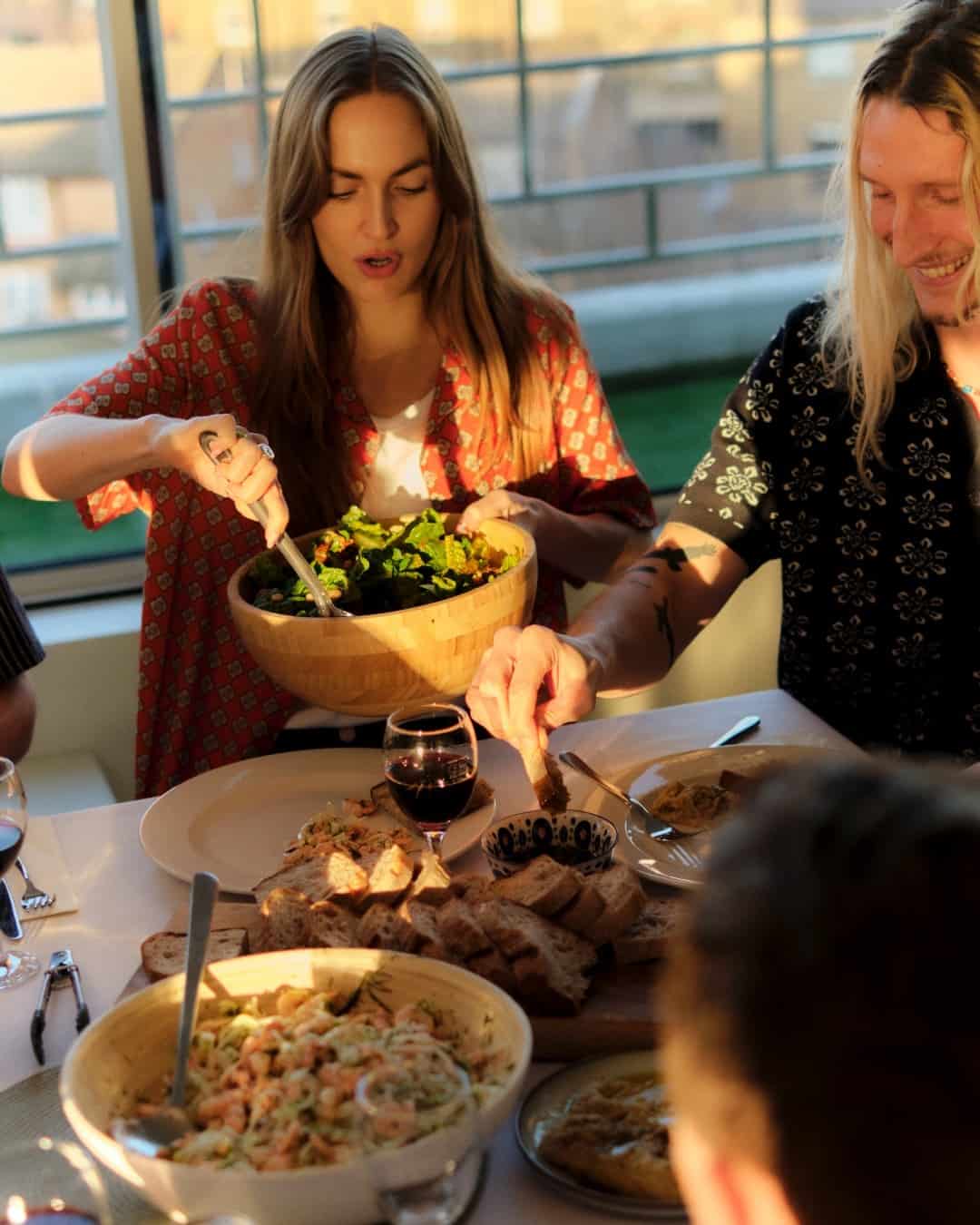 woman holding a bowl of salad