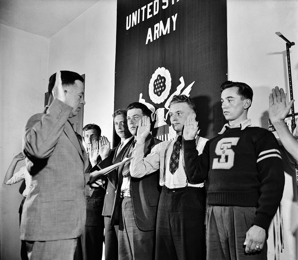 Youth in Twilight: Group of men being sworn in by Major Seth Gayle, Jr. in Washington, D.C., 1940