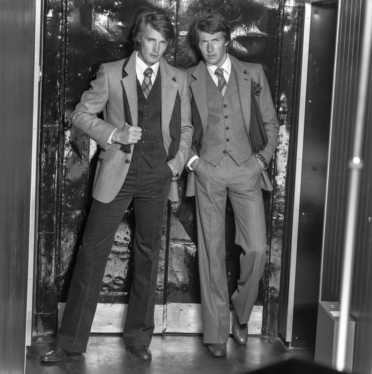 Two men in 1970s wearing three piece