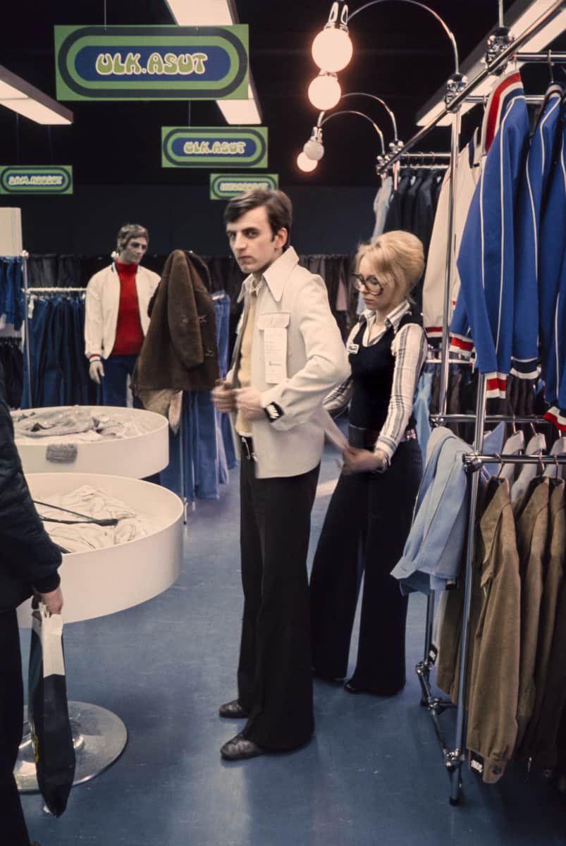 man in 1970s fitting a jacket