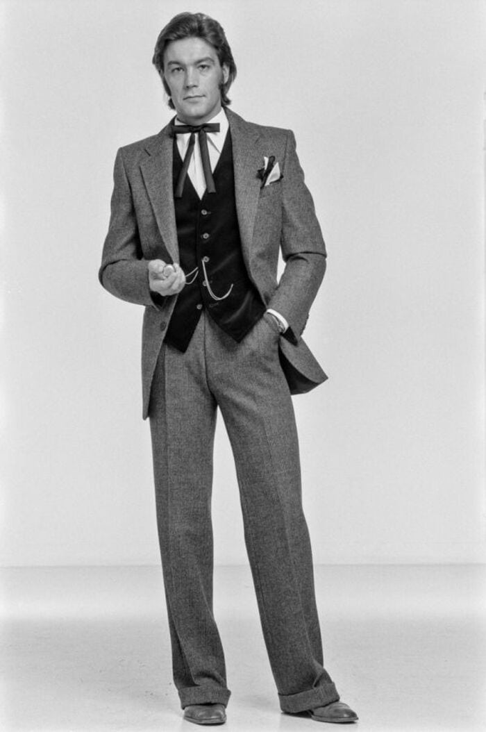 men in 1970s wearing a three piece suit