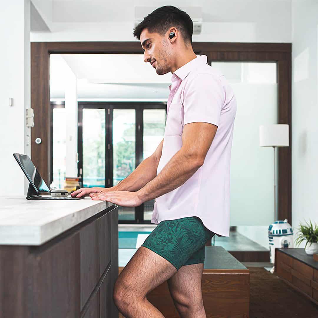 man working on his ipad