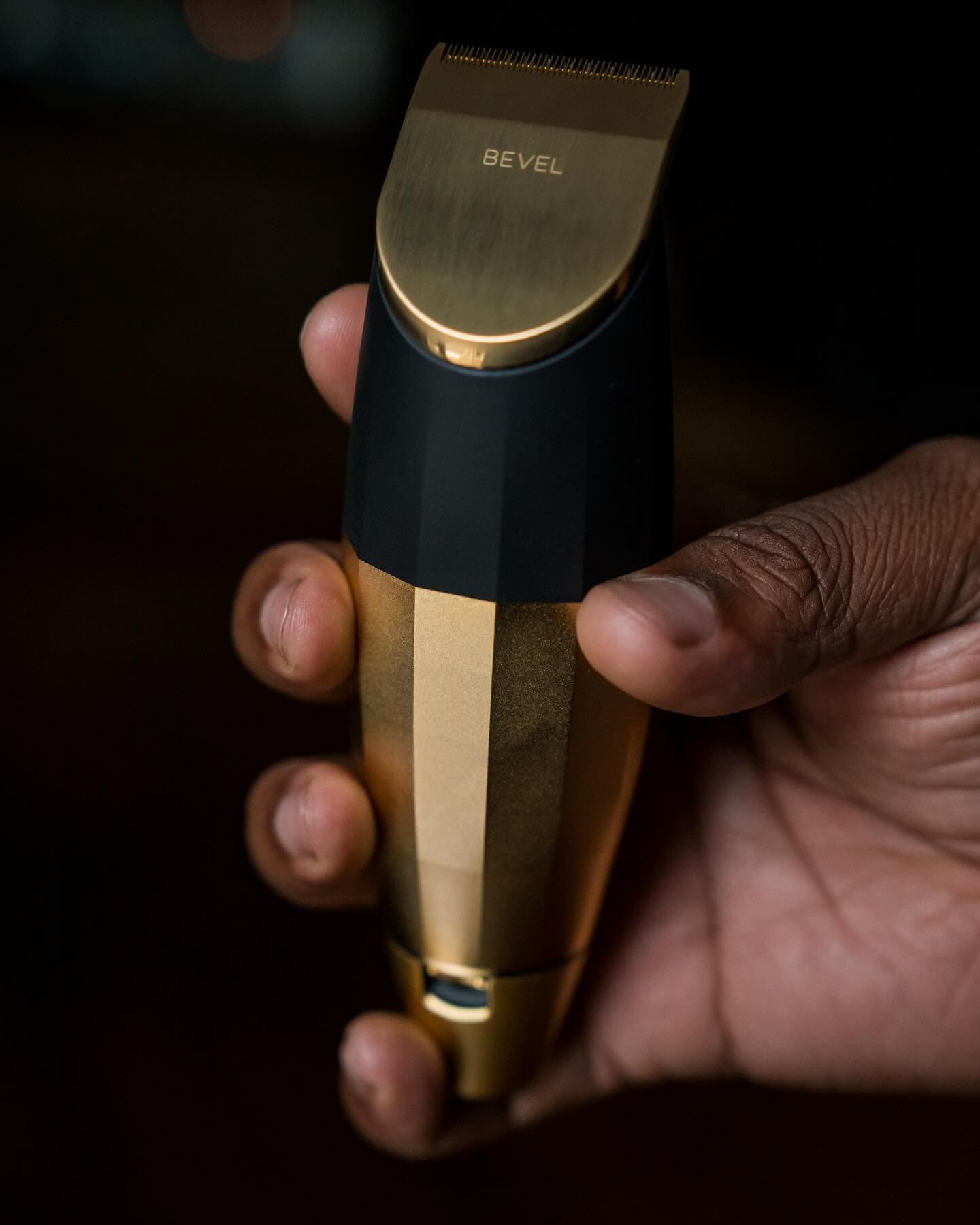 holding a bevel gold trimmer