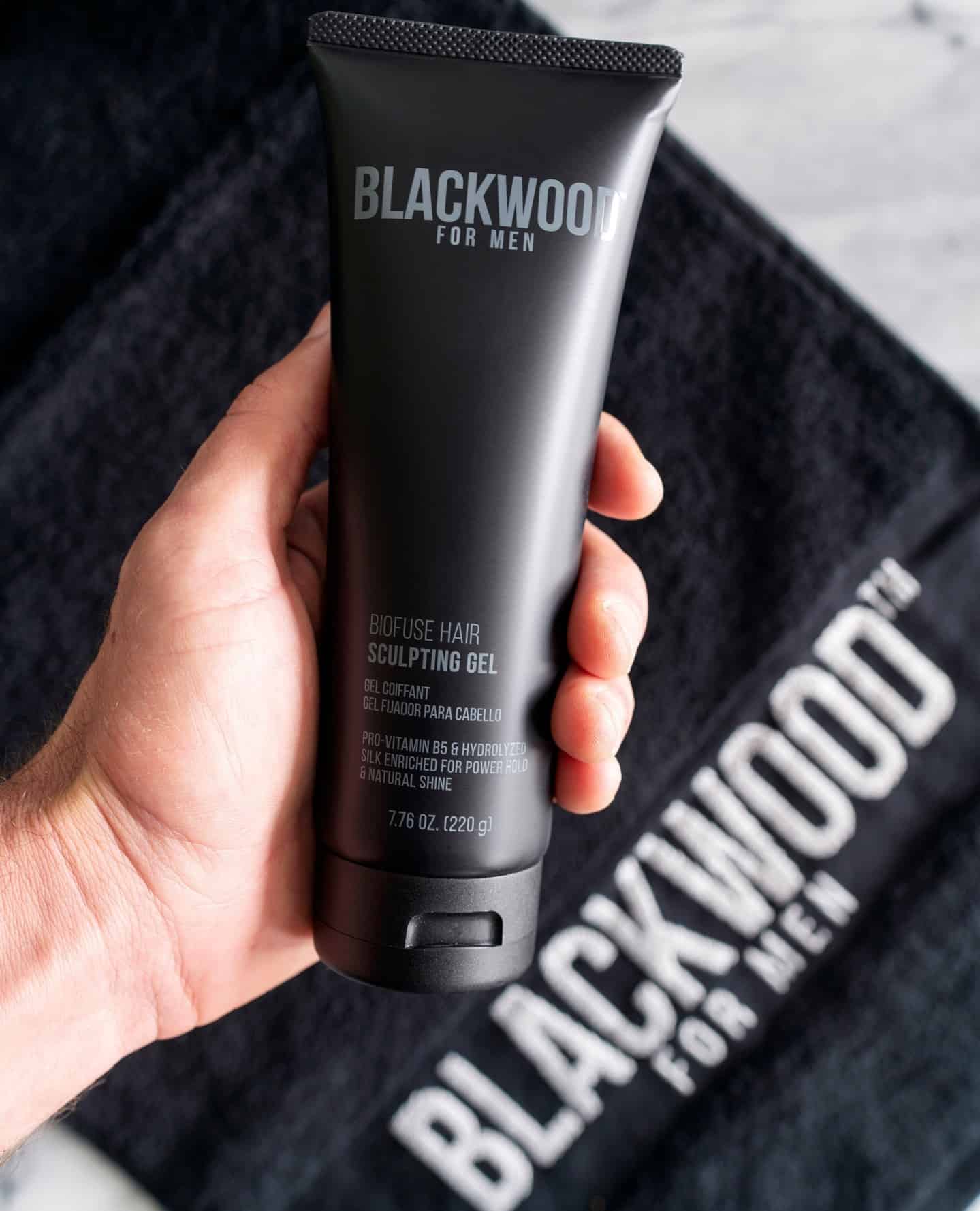 holding a tube of blackwood sculpting gel