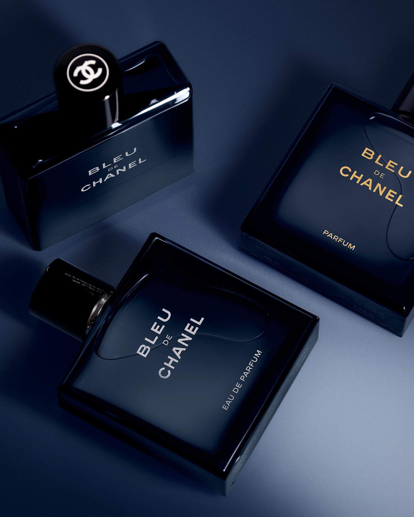 bottles of bleu de chanel colognes by chanel