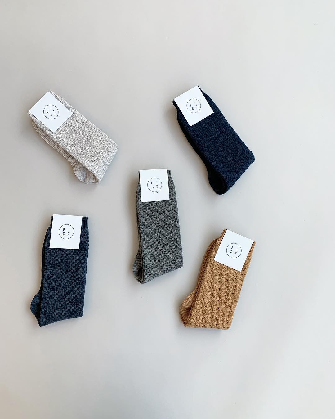 a collection of socks by form and thread