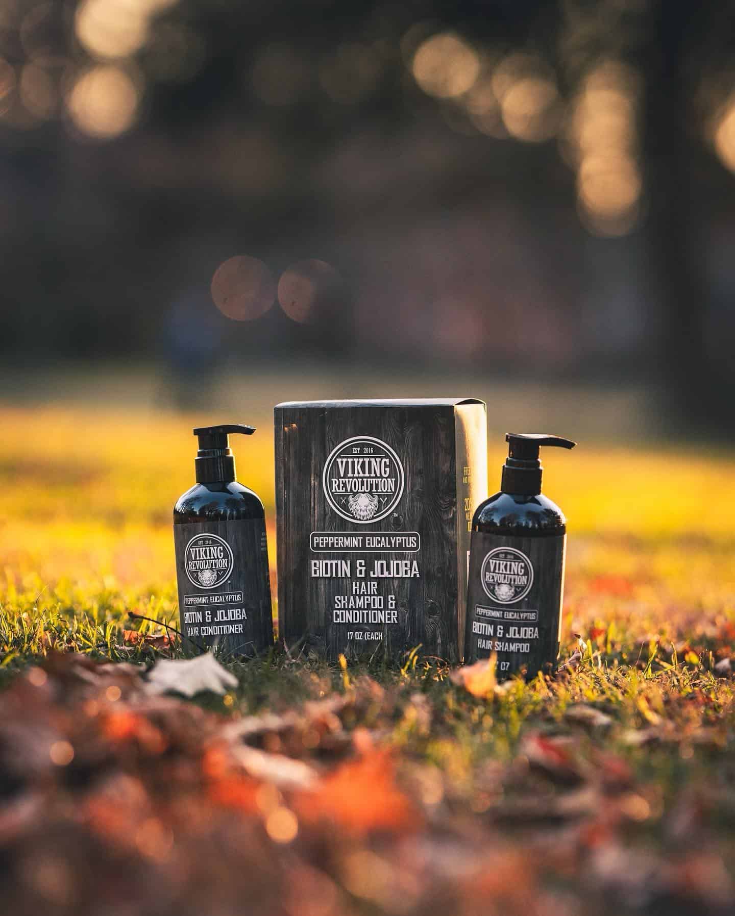 bottles of viking revolution shampoo and conditioner on the grass