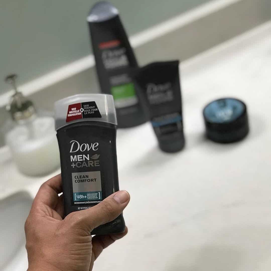 holding a dove men care clean comfort deodorant stick