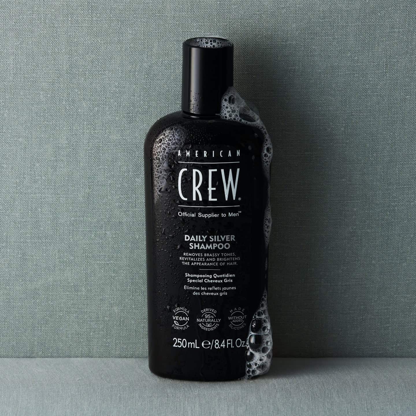 a bottle of daily silver shampoo by american crew