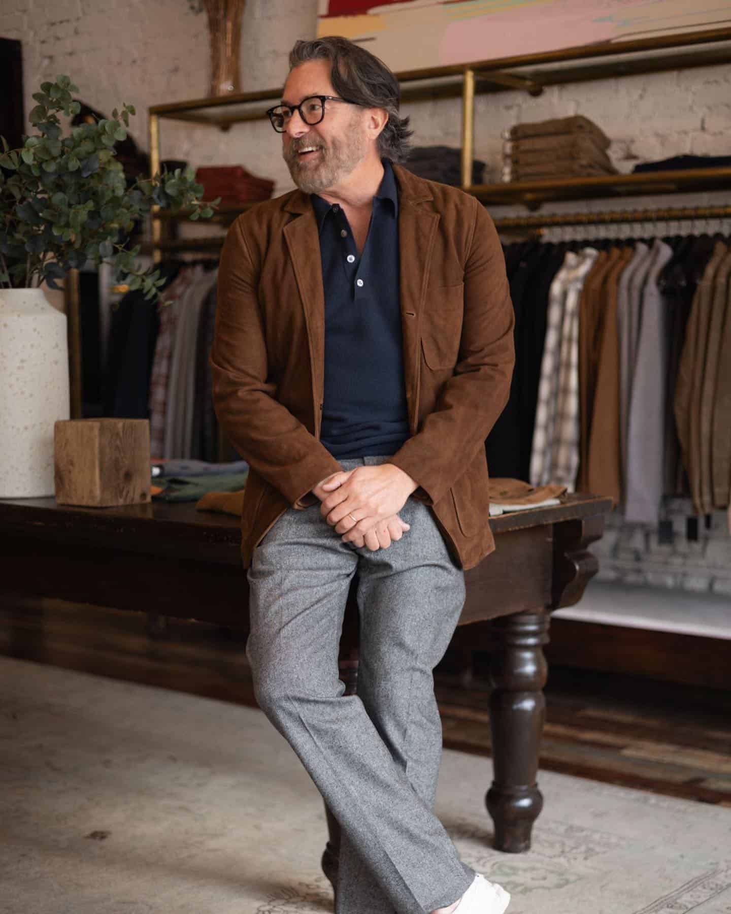 man wearing a brown corduroy blazer