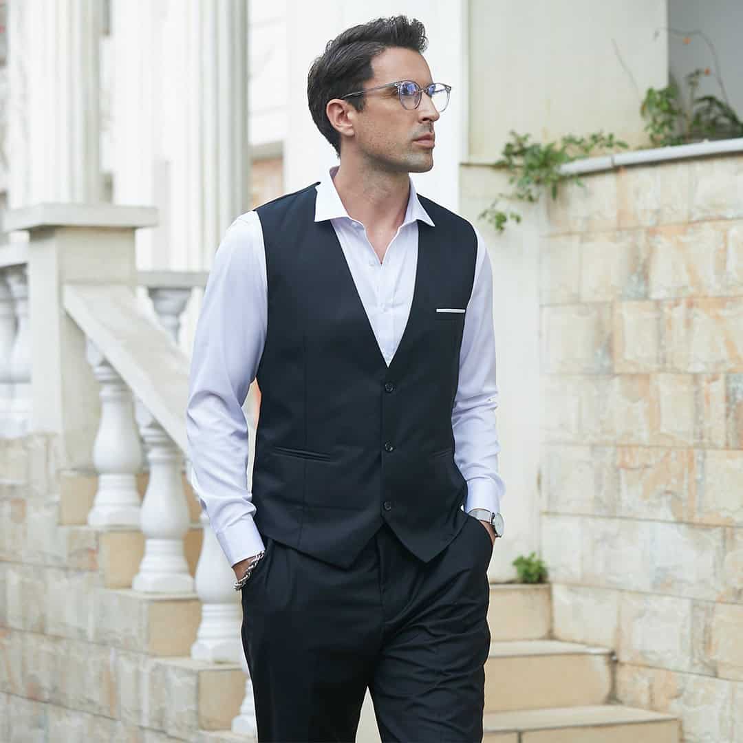 man wearing a navy suit vest