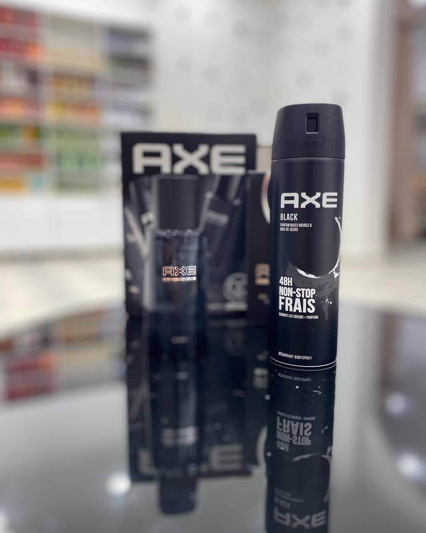 bottles of axe black body spray and cologne